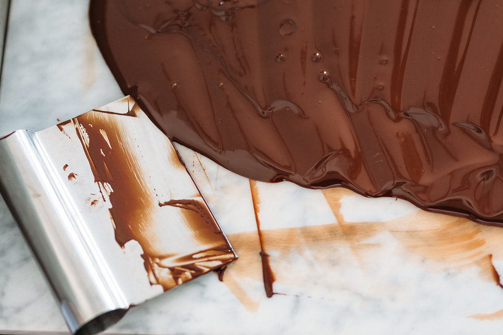 Melted chocolate on a marble slab